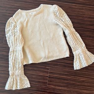 Designer crochet puff sleeve sweater